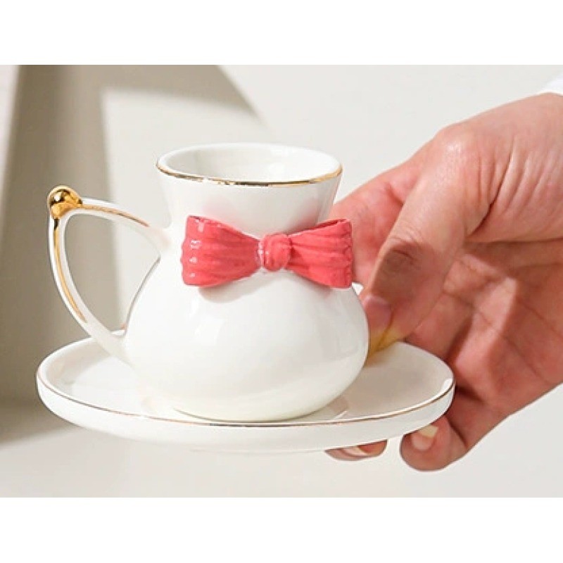 Product Hand Formed Bow Cup And Saucer Thumb 1